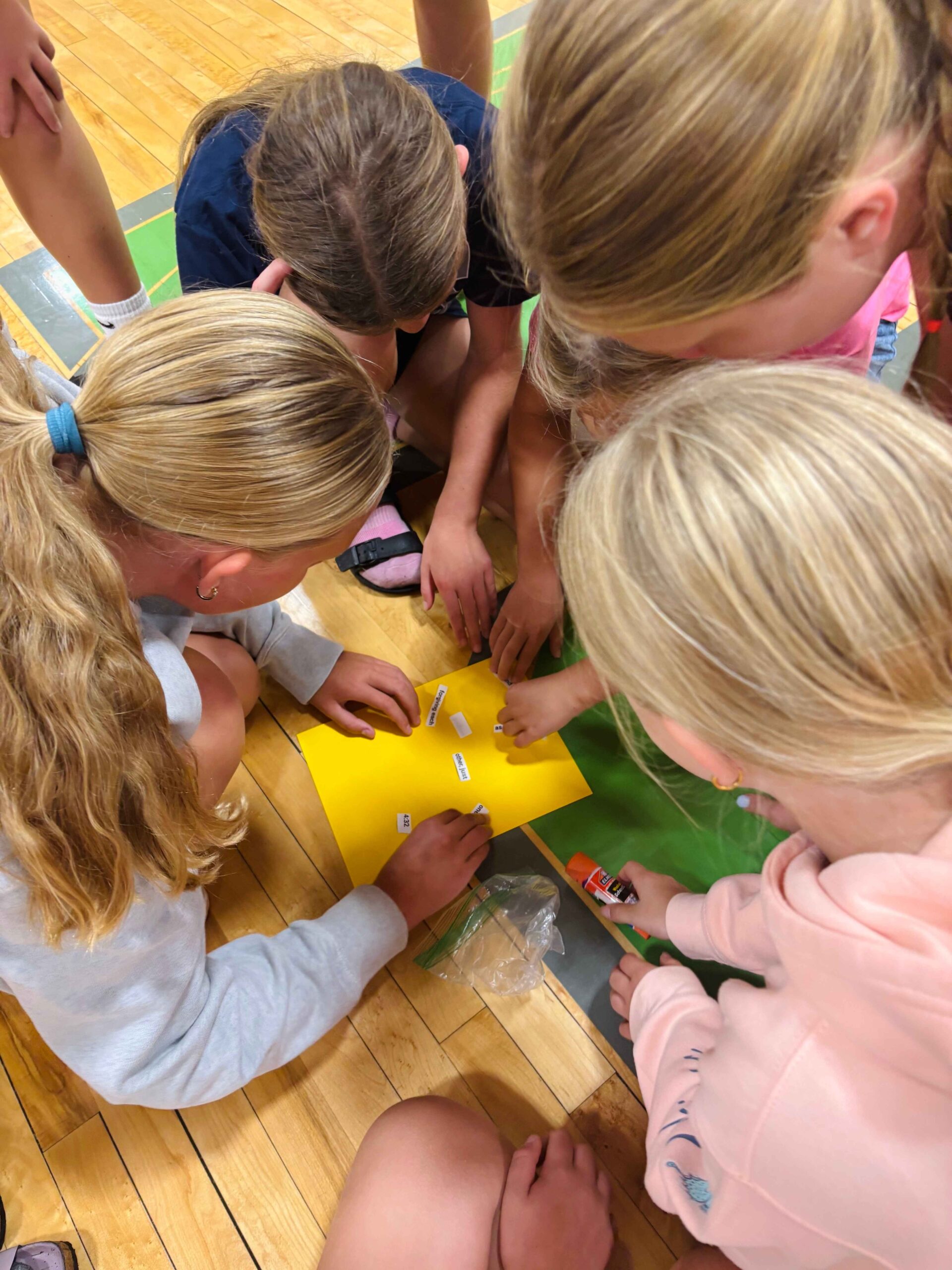 Middle school students participating in small groups at West Side Christian School