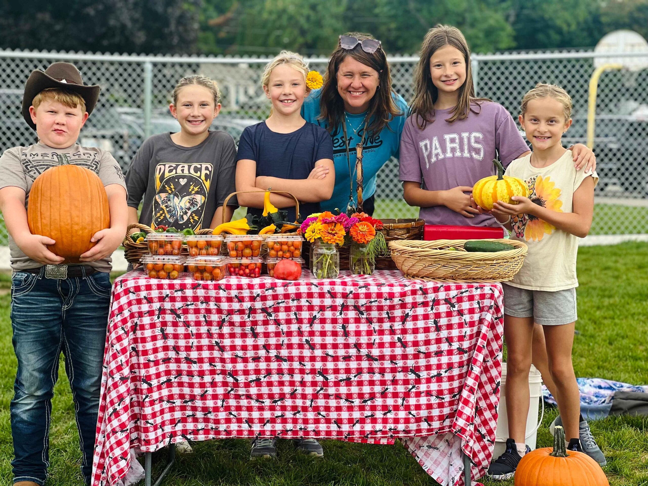 Students participating in garden-based outdoor education at West Side Christian School