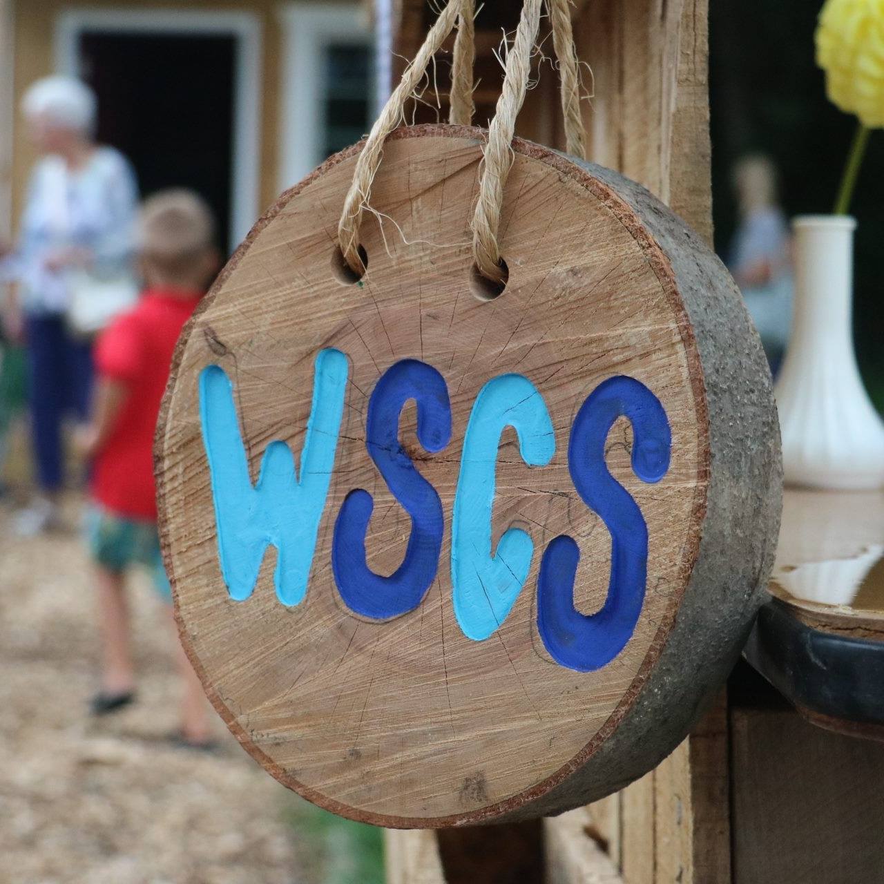 Students enjoying an outdoor learning experience at West Side Christian School